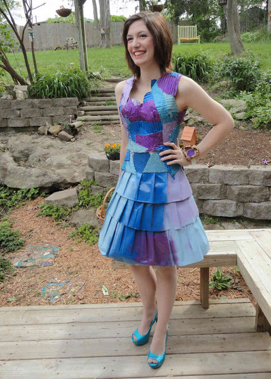 Maura Pozek poses in her prom dress made out of corrugated cardboard, paper bags and "lots of hot glue".