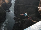 Here goes nothing. A big jump over the Zambezi River in Africa. Here goes nothing. A big jump over the Zambezi River in Africa.