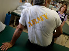 A veteran of the Iraq War with post-traumatic stress disorder talks to physical therapist Nicole Bormann before a session in the VA Medical Center in St. Louis. A veteran of the Iraq War with post-traumatic stress disorder talks to physical therapist Nicole Bormann before a session in the VA Medical Center in St. Louis.