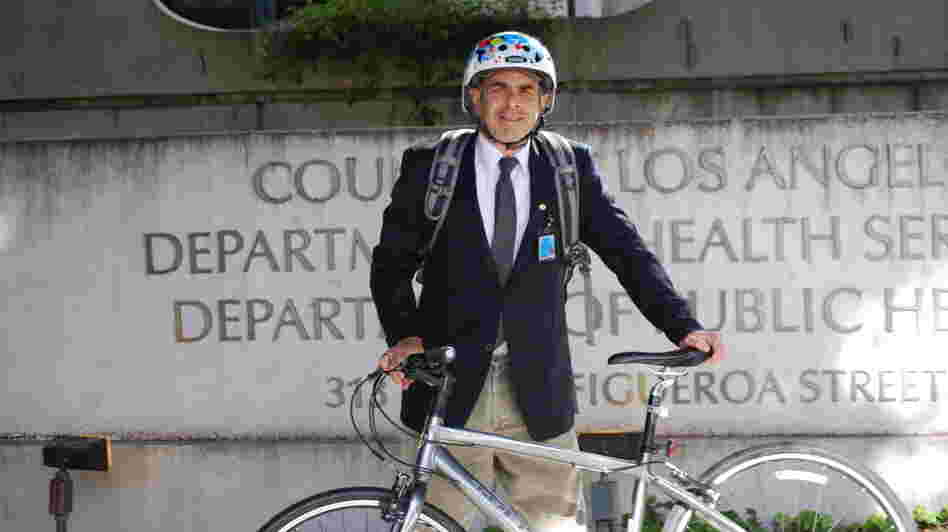Dr. Mitch Katz rides his bike to work, defying the commuting norm in Los Angeles. Dr. Mitch Katz rides his bike to work, defying the commuting norm in Los Angeles.