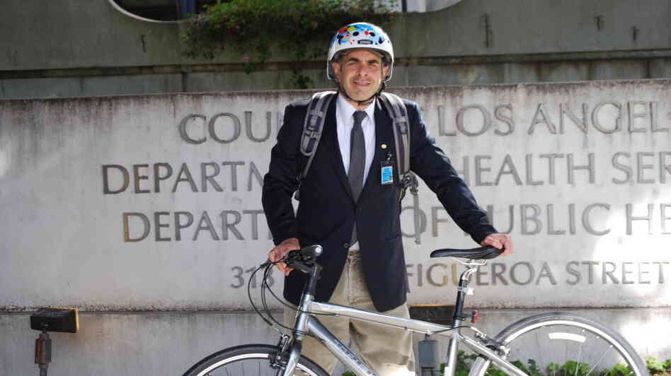 Dr. Mitch Katz rides his bike to work, defying the commuting norm in Los Angeles. Dr. Mitch Katz rides his bike to work, defying the commuting norm in Los Angeles.