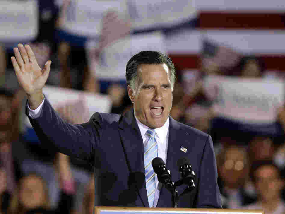Former Massachusetts Gov. Mitt Romney takes the stage at an election night rally in Manchester, N.H., on Tuesday night. Romney won nominating contests in Pennsylvania, Rhode Island, Connecticut and Delaware.
