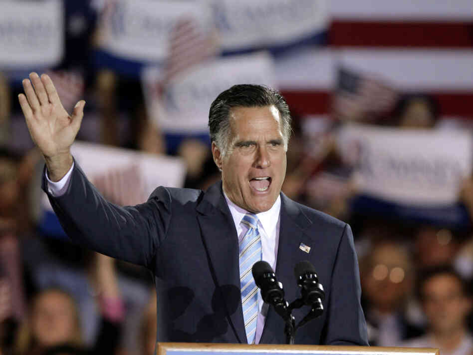 Former Massachusetts Gov. Mitt Romney takes the stage at an election night rally in Manchester, N.H., on Tuesday night. Romney won nominating contests in Pennsylvania, Rhode Island, Connecticut and Delaware.