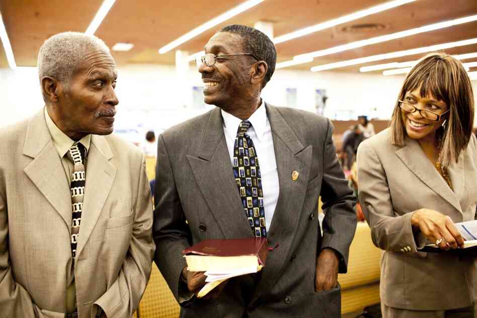 Natasha Shamone-Gilmore (right) attends church with her husband, Curtis Gilmore (center), and her father, Franklin Brunson, 81. Shamone-Gilmore moved Brunson into her Capitol Heights, Md., home after he developed dementia.