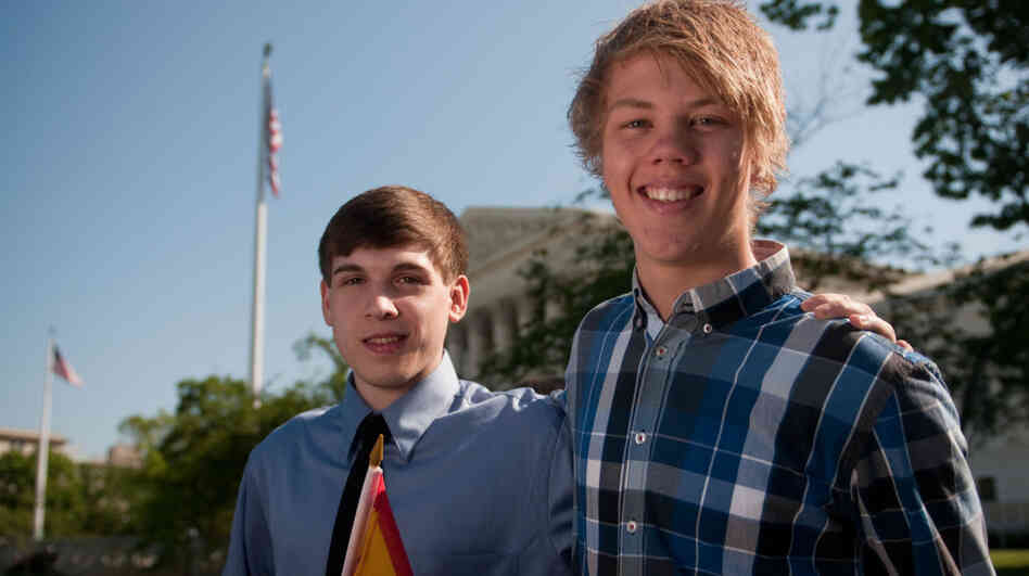 Benjamin Williams (right) and Ole Martin, classmates from Juneau, Alaska, disagree about SB 1070.