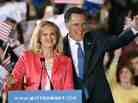 Ann Romney stands next to her husband and presidential candidate Mitt Romney.