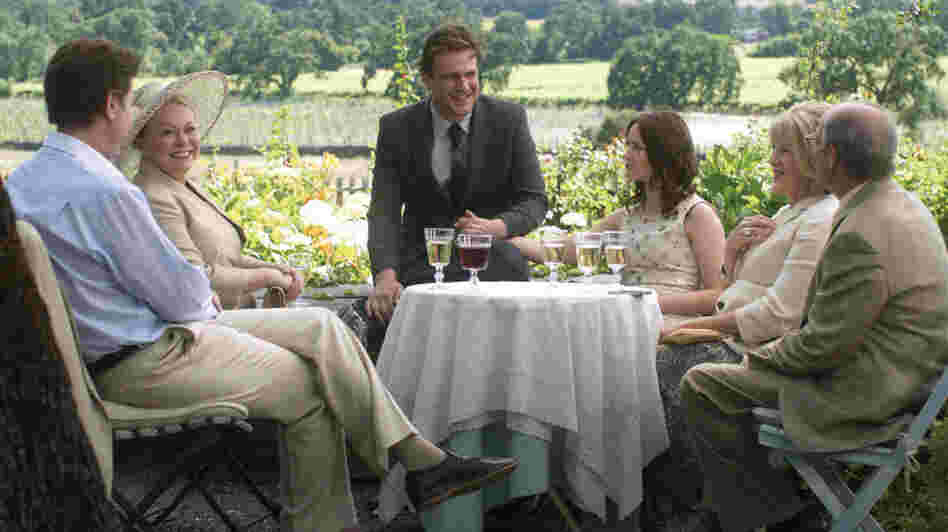 Tom (Jason Segel) and Violet (Emily Blunt) celebrate their impending nuptials with their families before Violet drops a bomb: She's been accepted at a program at the University of Michigan, and wants to move there and postpone their wedding day. Tom (Jason Segel) and Violet (Emily Blunt) celebrate their impending nuptials with their families before Violet drops a bomb: She's been accepted at a program at the University of Michigan, and wants to move there and postpone their wedding day.