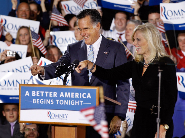 Republican presidential candidate Mitt Romney and his wife Ann celebrated Tuesday night in Manchester, N.H.