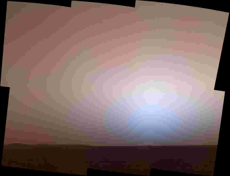The martian twilight sky at Gusev crater, as imaged by the panoramic camera on NASA's Mars Exploration Rover Spirit around 6:20 in the evening of the rover's 464th martian day (April 23, 2005).