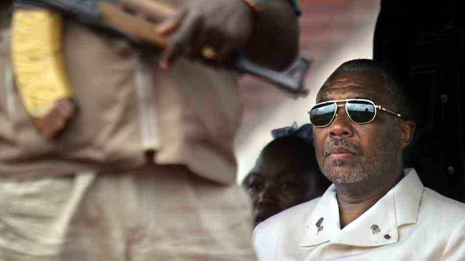 Liberian President Charles Taylor, shown here in the capital Monrovia in 2003, is charged with 11 counts of war crimes and crimes against humanity — including murder, rape, sexual slavery and the use of child soldiers — in neighboring Sierra Leone. A verdict is expected Thursday.