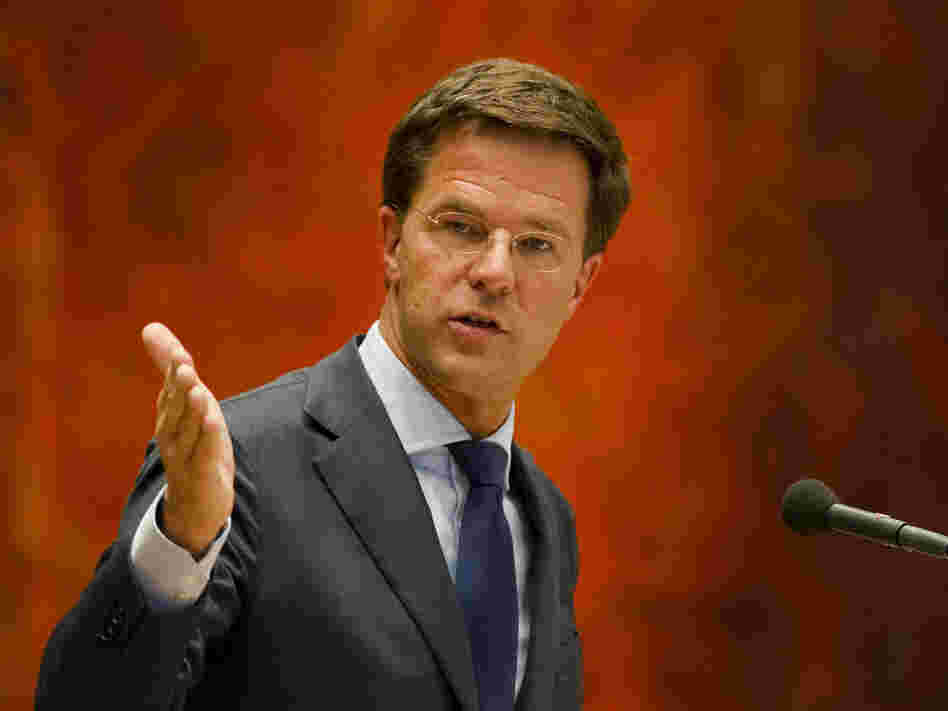 Dutch Prime Minister Mark Rutte, shown here speaking in Parliament on Tuesday, resigned a day earlier over a budget crisis.