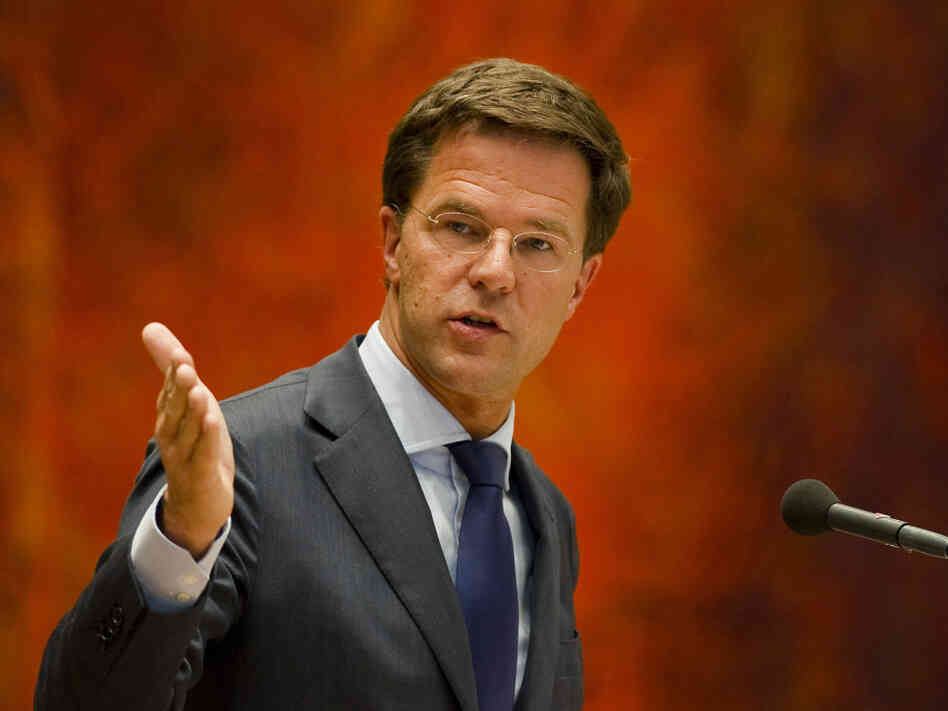 Dutch Prime Minister Mark Rutte, shown here speaking in Parliament on Tuesday, resigned a day earlier over a budget crisis.
