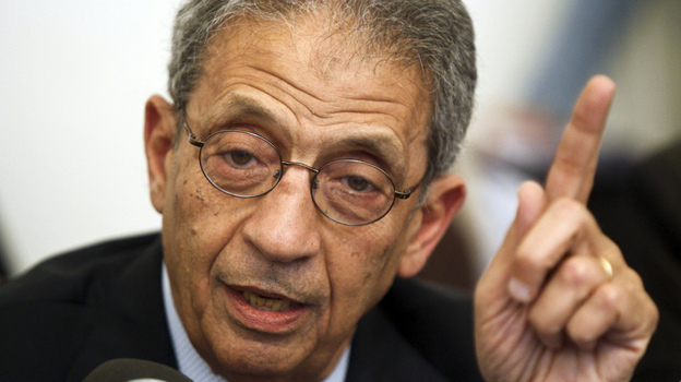 Amr Moussa, the front-runner in the Egyptian presidential race, speaks during a press conference in Cairo on Apr. 22. The country's election commission said Thursday that Moussa and 12 other candidates are eligible to compete in next month's election. Amr Moussa, the front-runner in the Egyptian presidential race, speaks during a press conference in Cairo on Apr. 22. The country's election commission said Thursday that Moussa and 12 other candidates are eligible to compete in next month's election.