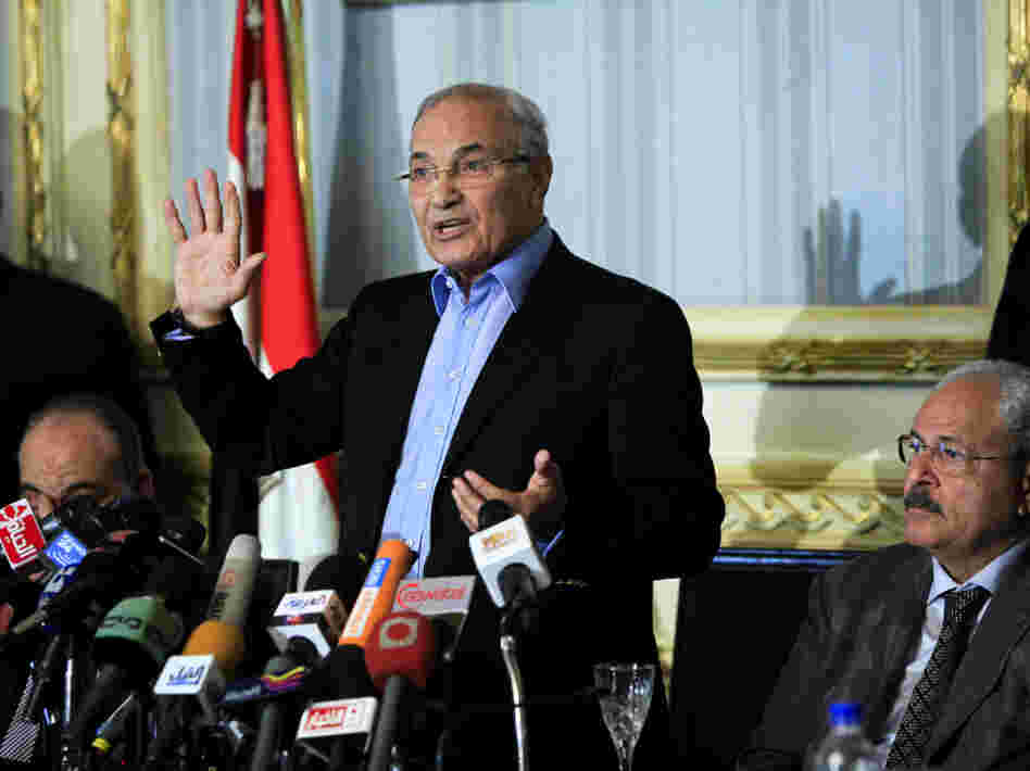 Ahmed Shafiq, who served as prime minister under Hosni Mubarak, will be allowed to take part in Egypt's presidential race. The country's election commission said Thursday that he is eligible, one day after he had been ruled ineligible. In this photo, he's shown speaking at a news conference in February 2011.