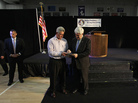 Newt Gingrich signs an autograph for supporter Jeff Legg as members of the Secret Service look on at Delmarva Christian High School in Georgetown, Del., on April 18.