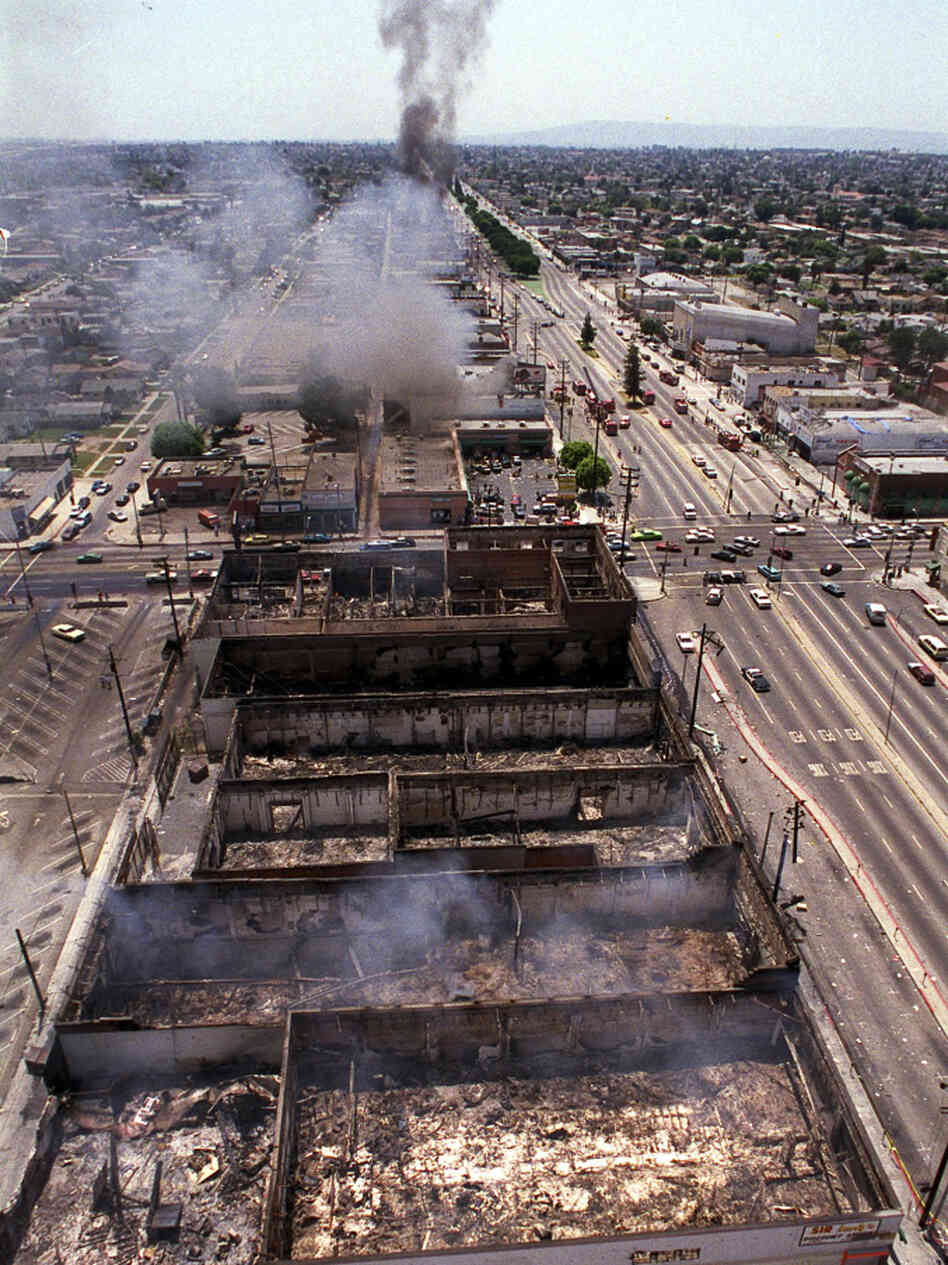 Smoke rises as fires burn out of control near Vermont Street in Los Angeles on April 30, 1992. Riots erupted after L.A. police officers were acquitted in the beating of black motorist Rodney King.