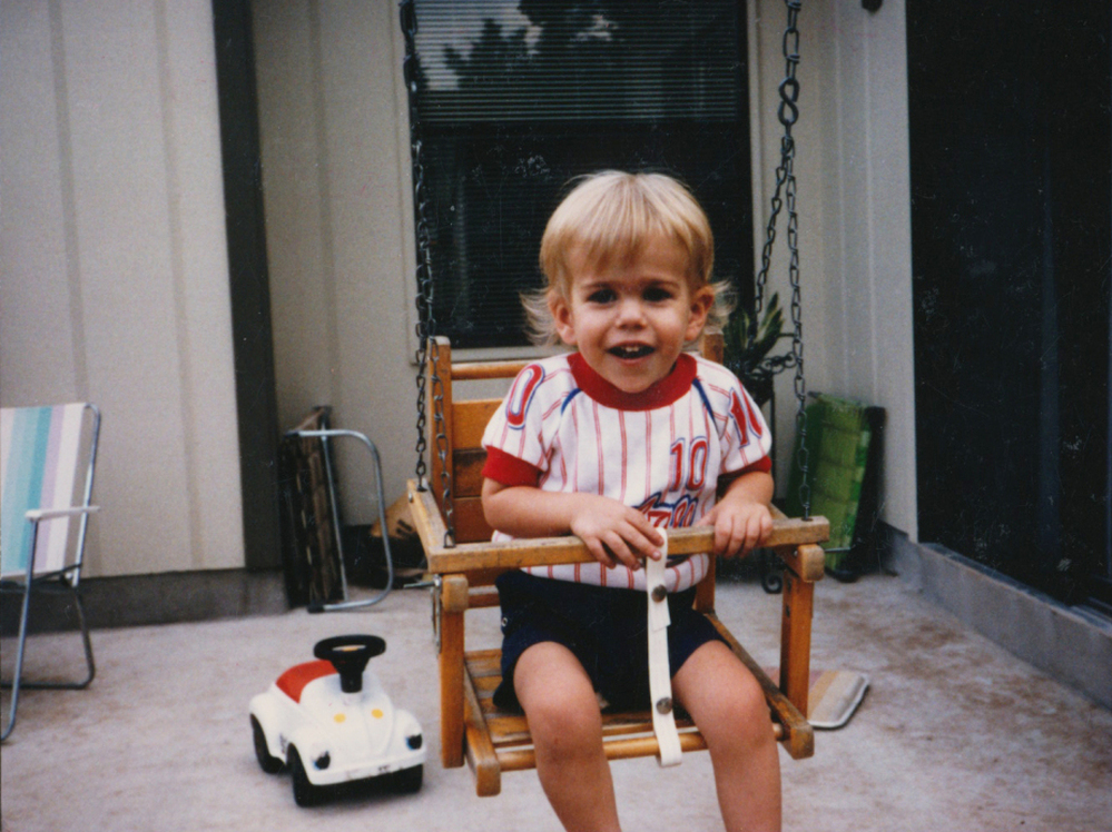 Eric Morton's mother was killed in their home, a year after this photograph was taken.