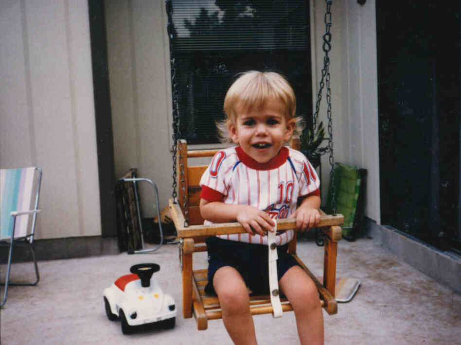 Eric Morton's mother was killed in their home, a year after this photograph was taken.