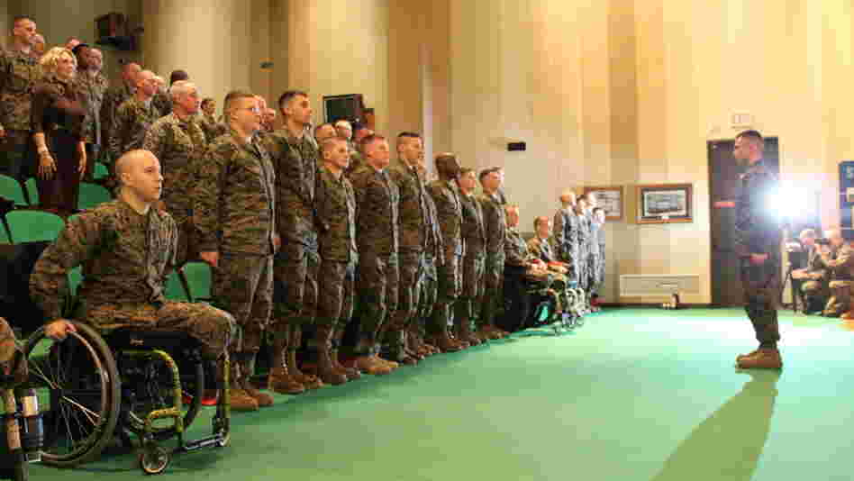 Wounded Warrior Battalions have been set up to help troops returning from combat recover from their injuries. But recent Pentagon reviews have found a pattern of overmedication in such battalions. Here, Marines assigned to Wounded Warrior Battalion East at Walter Reed National Military Medical Center in Bethesda, Md., graduate from a training course in January. Wounded Warrior Battalions have been set up to help troops returning from combat recover from their injuries. But recent Pentagon reviews have found a pattern of overmedication in such battalions. Here, Marines assigned to Wounded Warrior Battalion East at Walter Reed National Military Medical Center in Bethesda, Md., graduate from a training course in January.