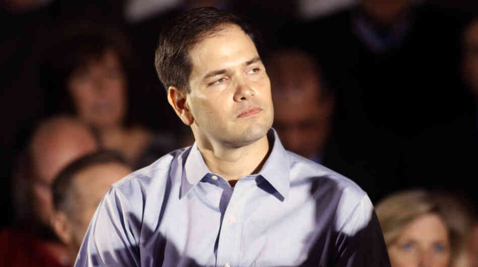 Sen. Marco Rubio, R-Fla., the son of Cuban immigrants, has urged his fellow conservatives to soften their rhetoric on illegal immigration. Above, he makes a campaign stop with Republican presidential candidate Mitt Romney on Monday in Aston, Pa. Sen. Marco Rubio, R-Fla., the son of Cuban immigrants, has urged his fellow conservatives to soften their rhetoric on illegal immigration. Above, he makes a campaign stop with Republican presidential candidate Mitt Romney on Monday in Aston, Pa.
