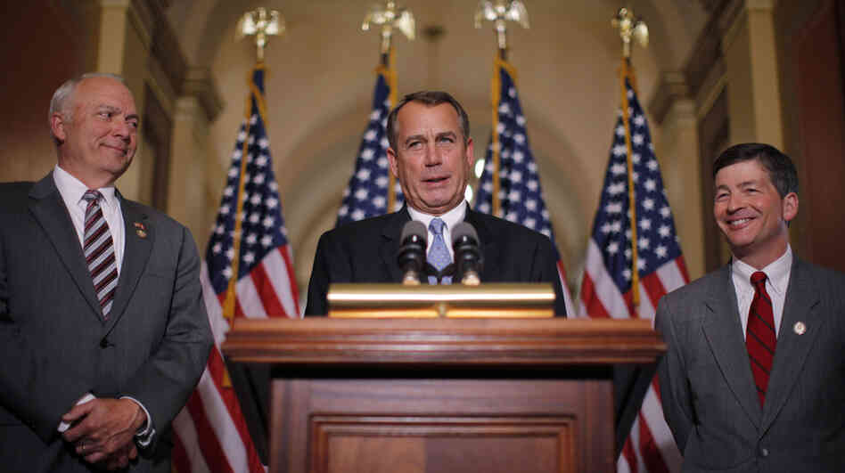 House Speaker John Boehner of Ohio, accompanied by fellow Republicans John Kline (left) of Minnesota and Jeb Hensarling of Texas, speaks about the student loan bill on Wednesday.