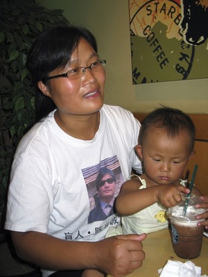 Yuan Weijing, the wife of activist Chen Guangcheng, is shown with the couple's daughter in a 2007 interview in Beijing. The girl, now 6, is followed to school every day by Chinese security agents, who always check her schoolbag, according to Chen. Yuan Weijing, the wife of activist Chen Guangcheng, is shown with the couple's daughter in a 2007 interview in Beijing. The girl, now 6, is followed to school every day by Chinese security agents, who always check her schoolbag, according to Chen.