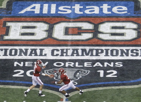Alabama quarterback A.J. McCarron, left, hands off to running back Trent Richardson during the BCS National Championship college football game against LSU in New Orleans last January. Alabama quarterback A.J. McCarron, left, hands off to running back Trent Richardson during the BCS National Championship college football game against LSU in New Orleans last January.