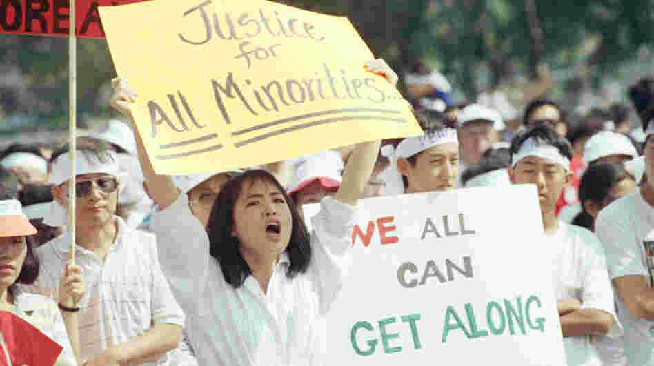 A crowd of more than a thousand rallied in Los Angeles on May 2, 1992, calling for healing between Koreans and the African-American community. A crowd of more than a thousand rallied in Los Angeles on May 2, 1992, calling for healing between Koreans and the African-American community.