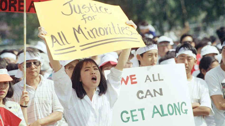 A crowd of more than a thousand rallied in Los Angeles on May 2, 1992, calling for healing between Koreans and the African-American community. A crowd of more than a thousand rallied in Los Angeles on May 2, 1992, calling for healing between Koreans and the African-American community.