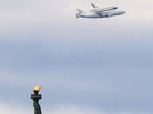 Riding atop a 747 shuttle carrier aircraft, the space shuttle Enterprise flew past the Statue of Liberty in New York Harbor today. Riding atop a 747 shuttle carrier aircraft, the space shuttle Enterprise flew past the Statue of Liberty in New York Harbor today.