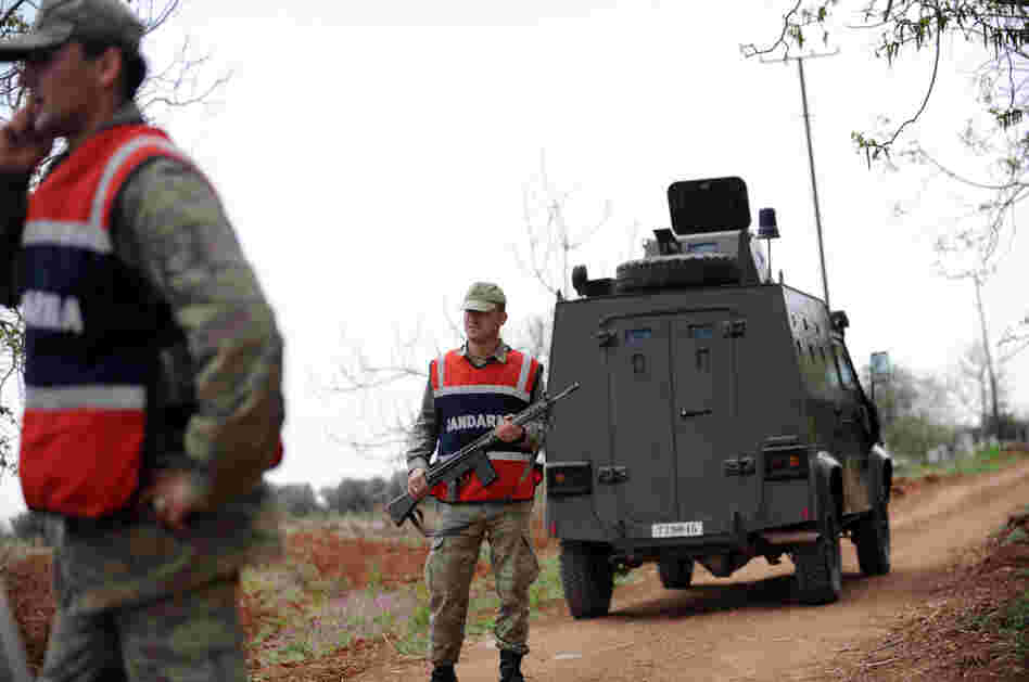 Turkish army personnel patrol near the border with Syria in Kilis earlier this month. Activists and smugglers say it's getting harder to get medical and communications equipment into Syria across the Turkish border. Turkish army personnel patrol near the border with Syria in Kilis earlier this month. Activists and smugglers say it's getting harder to get medical and communications equipment into Syria across the Turkish border.