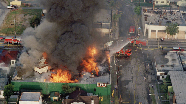 A fire burns out of control at the corner of 67th St. and West Blvd. in South Central Los Angeles on April 30, 1992. Hundreds of buildings burned when riots erupted after the verdicts in the Rodney King case were announced.
