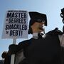 Gan Golan of Los Angeles, dressed as the "Master of Degrees," holds a ball and chain representing his college loan debt during Occupy D.C. activities in Washington. Average in-state tuition and fees at four-year public colleges rose an additional $631 this fall, or 8.3 percent, compared with a year ago. Gan Golan of Los Angeles, dressed as the "Master of Degrees," holds a ball and chain representing his college loan debt during Occupy D.C. activities in Washington. Average in-state tuition and fees at four-year public colleges rose an additional $631 this fall, or 8.3 percent, compared with a year ago.