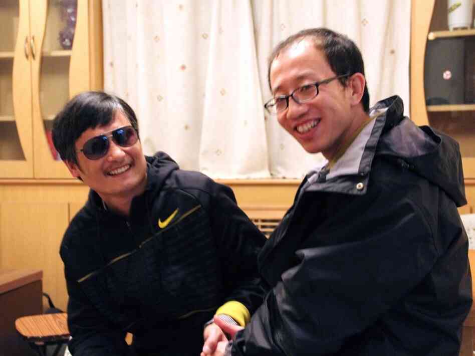 Chen Guangchen, left, meets with fellow activist Hu Jia at an undisclosed location following Chen's escape. "Chen's case has become the epitome of China's human rights situation," Hu says. Chen Guangchen, left, meets with fellow activist Hu Jia at an undisclosed location following Chen's escape. "Chen's case has become the epitome of China's human rights situation," Hu says.