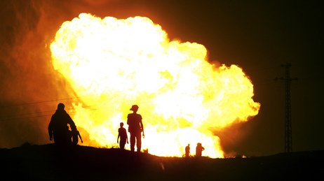 Bedouins watch flames rise in July 2011 after masked gunmen blew up a terminal of the Egyptian natural gas pipeline to Israel and Jordan. It was one of many attacks on the pipeline since the popular uprising that ousted longtime Egyptian leader Hosni Mubarak last year. Bedouins watch flames rise in July 2011 after masked gunmen blew up a terminal of the Egyptian natural gas pipeline to Israel and Jordan. It was one of many attacks on the pipeline since the popular uprising that ousted longtime Egyptian leader Hosni Mubarak last year.
