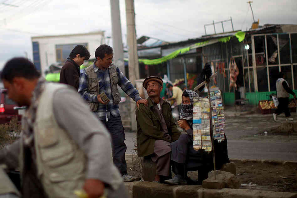 Money-changer and phone card salesmen