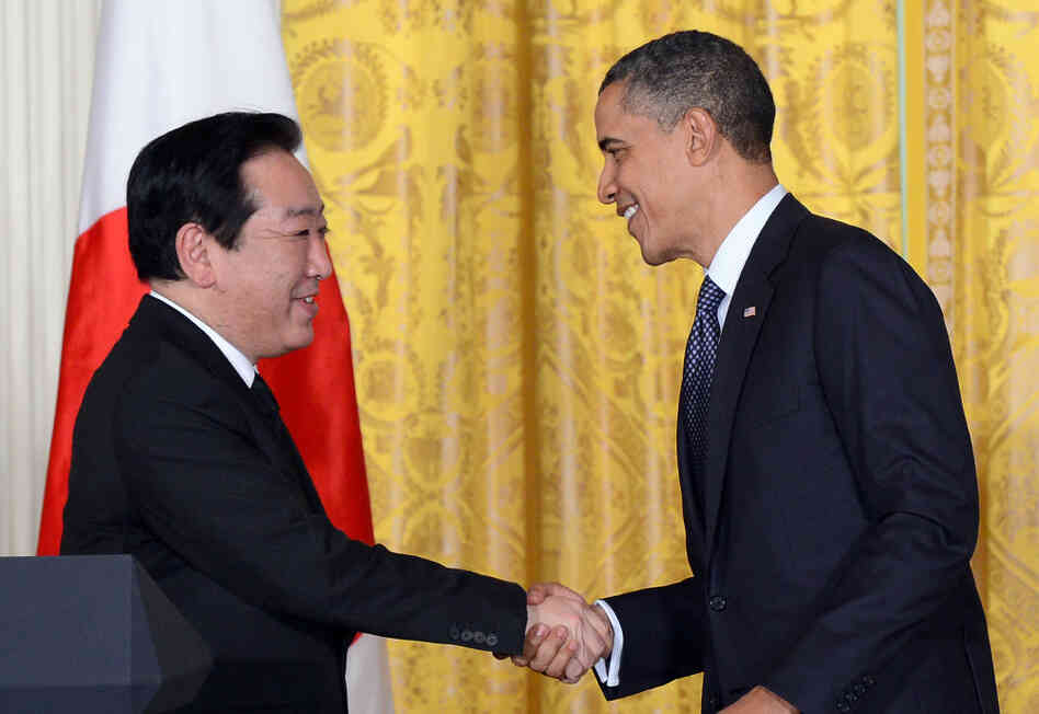 U.S. President Barack Obama shakes hands with Japan's Prime Minister Yoshihiko Noda during a joint press conference in the East Room at the White House in Washington, DC, on Monday.