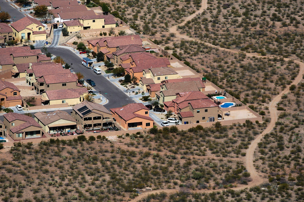 While some sections of Arizona's housing market have shown signs of recovery, potential homebuyers who are looking for affordable houses have been frustrated. This file photo from 2008 shows a subdivision extending into desert scrubland.