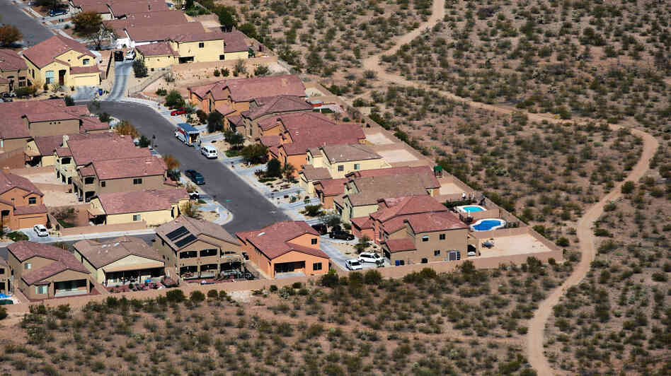 While some sections of Arizona's housing market have shown signs of recovery, potential homebuyers who are looking for affordable houses have been frustrated. This file photo from 2008 shows a subdivision extending into desert scrubland.