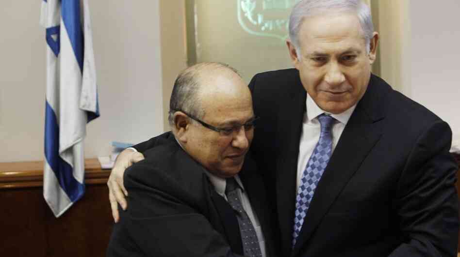 Israeli Prime Minister Benjamin Netanyahu embraces Meir Dagan, the then-outgoing chief of the Mossad intelligence agency, in January 2011. Dagan is among former security chiefs who have recently criticized Netanyahu, saying he has exaggerated the urgency of the threat posed by Iran's nuclear program. Israeli Prime Minister Benjamin Netanyahu embraces Meir Dagan, the then-outgoing chief of the Mossad intelligence agency, in January 2011. Dagan is among former security chiefs who have recently criticized Netanyahu, saying he has exaggerated the urgency of the threat posed by Iran's nuclear program.