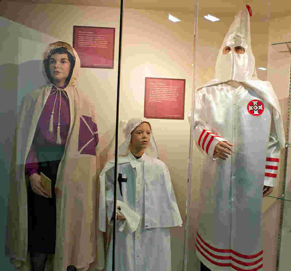 Museum displays include examples of robes worn by the men, women and children of the Ku Klux Klan.