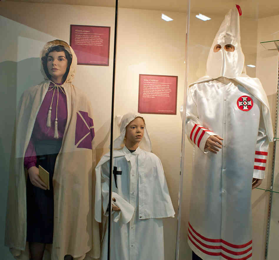 Museum displays include examples of robes worn by the men, women and children of the Ku Klux Klan.