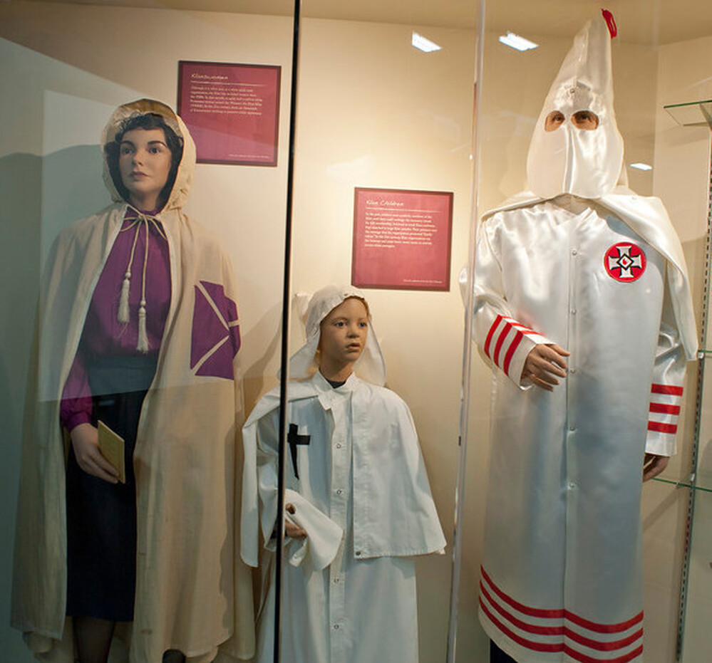 Museum displays include examples of robes worn by the men, women and children of the Ku Klux Klan.