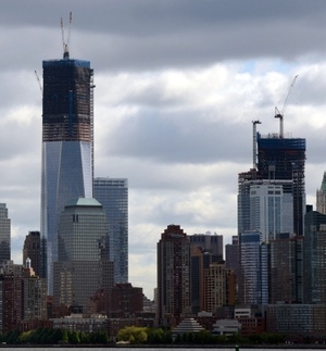 Rising above the Manhattan skyline: 1 World Trade Center. Rising above the Manhattan skyline: 1 World Trade Center.