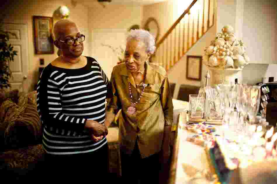 Geneva Hunter (left) and her daughter, Yolanda, decided to take a hands-on approach to Ida's care. Ida lives with Geneva, and Yolanda quit her job to become Ida's daytime caregiver.