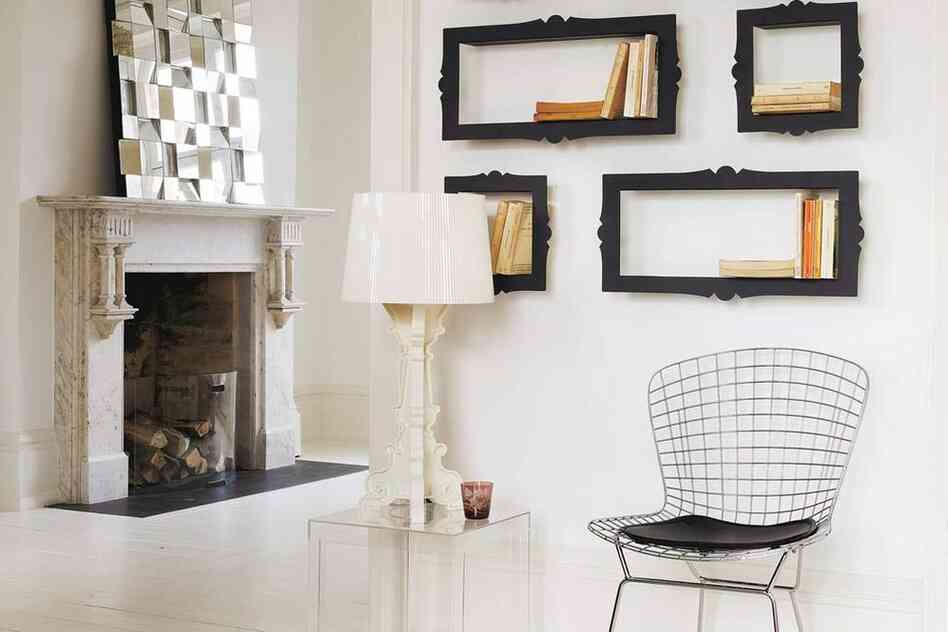 Barok: Black metallic bookshelves are used to "frame" books.
