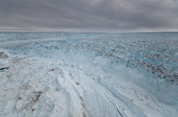 Massive sections of ice (center front) have broken away from the Jakobshavn glacier into the sea. There's enough water stored in Greenland's glaciers to raise the sea level by 20 feet.
