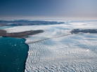 Researchers studying Greenland's ice say it is melting more slowlyl than previously thought. Here, ice travels down a relatively small outlet glacier into the sea. Researchers studying Greenland's ice say it is melting more slowlyl than previously thought. Here, ice travels down a relatively small outlet glacier into the sea.