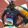 In his first race at the 5000-meter distance, runner Lopez Lomong set a 2012 world record. But the American also ran into some unusual trouble late in the race. This file photo shows Lomong at the 2008 Olympics. In his first race at the 5000-meter distance, runner Lopez Lomong set a 2012 world record. But the American also ran into some unusual trouble late in the race. This file photo shows Lomong at the 2008 Olympics.