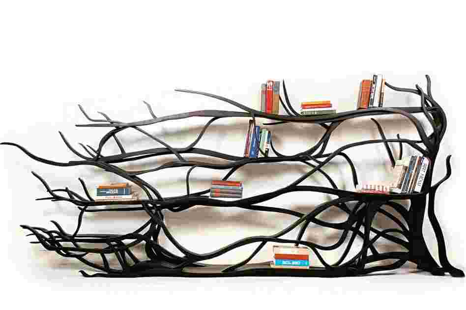 Metamorphosis: The shelves of Sebastian Errazuriz's one-off, hand-carved bookcase were inspired by the branches that grew on his childhood home in Santiago, Chile.